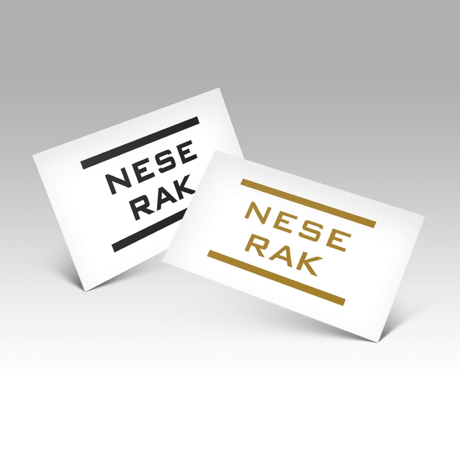 NESERAK-rakennusliikkeen kultainen logo